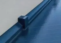 طبقة الحماية والتشطيب عند حافة السطح